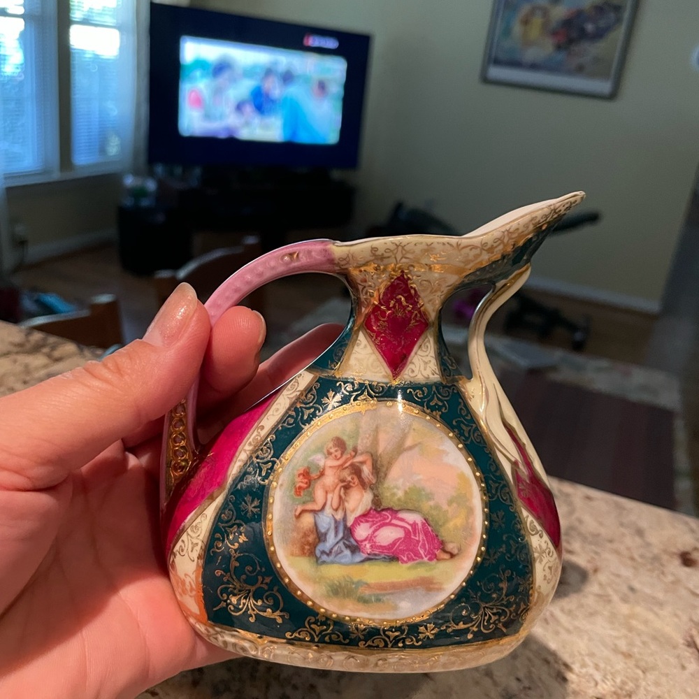 Vintage Austria beehive mark hand painted porcelain creamer